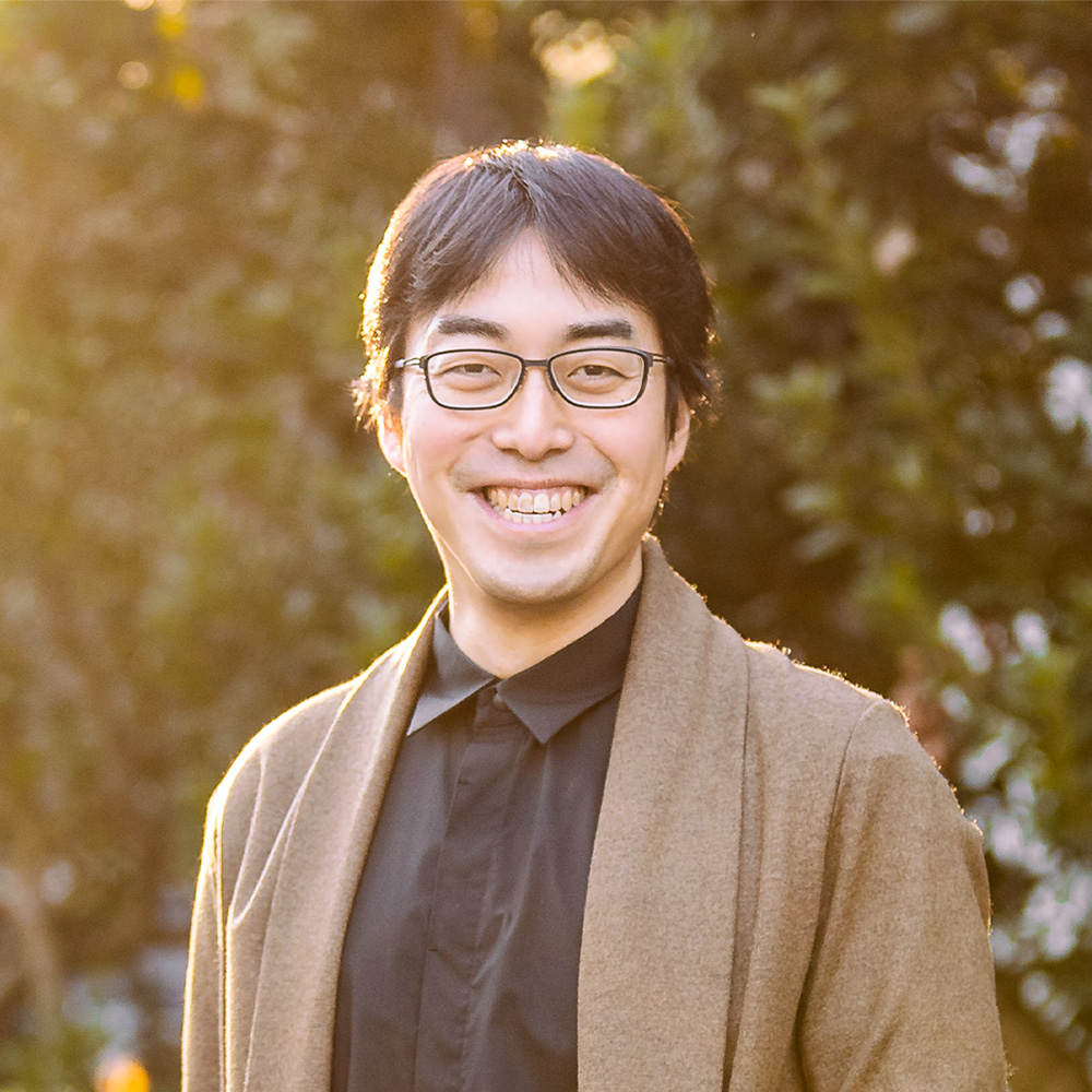 成田悠輔